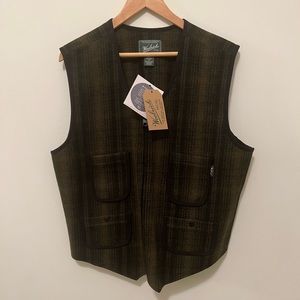 Woolrich vest. Untouched and unworn. Perfect under with and under denim. Warm.
